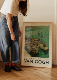 Vincent Van Gogh Quay with men unloading barges poster
