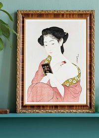 Woman Applying Powder by Goyo Hashiguchi