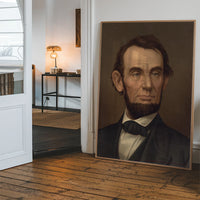 Vintage gentleman portrait print hung in a hallway