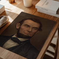 Framed vintage gentleman portrait on a dining room wall