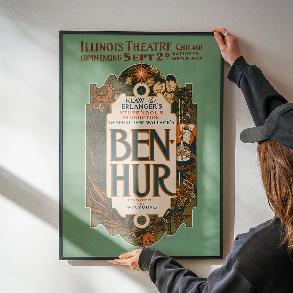 Framed vintage theatre poster print in a kitchen setting