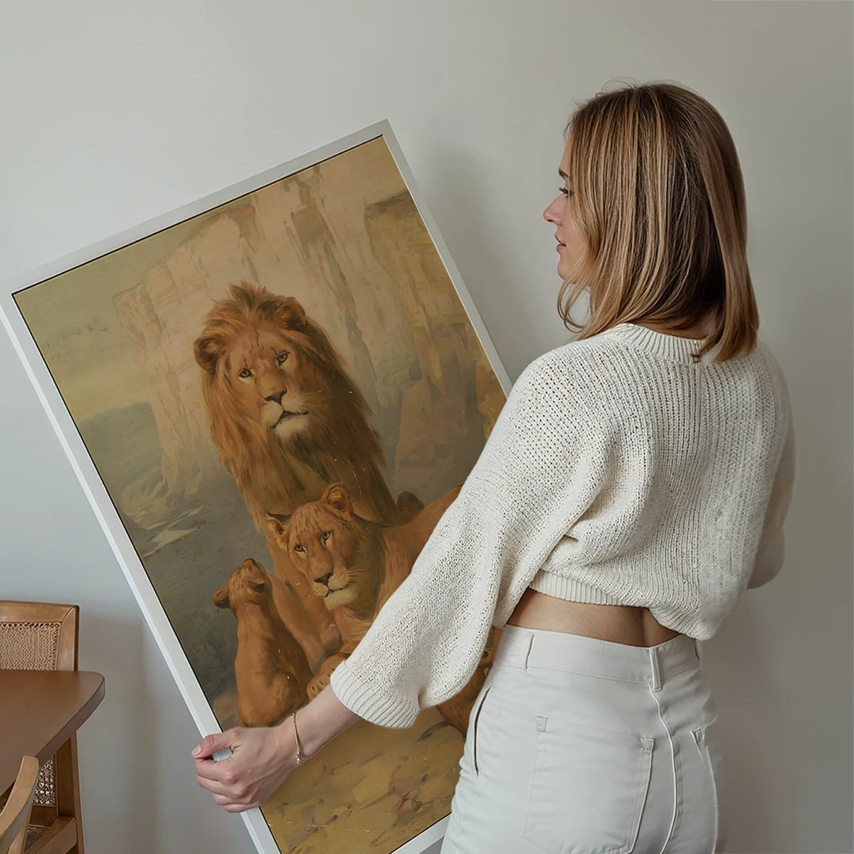 Vintage lion family painting framed above a sofa in a cosy living room