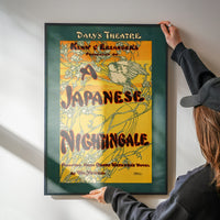 The print with warm yellow tones brightening a kitchen wall