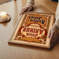 The print of a Victorian Romeo and Juliet playbill above a bedroom bed
