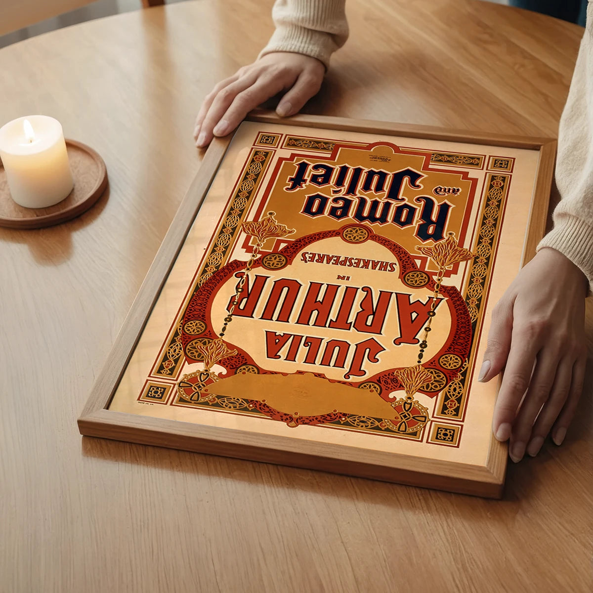 The print of a Victorian Romeo and Juliet playbill above a bedroom bed