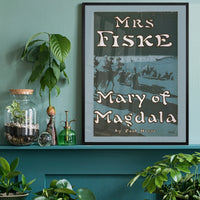 Vintage theatre poster caravan print on a home office wall