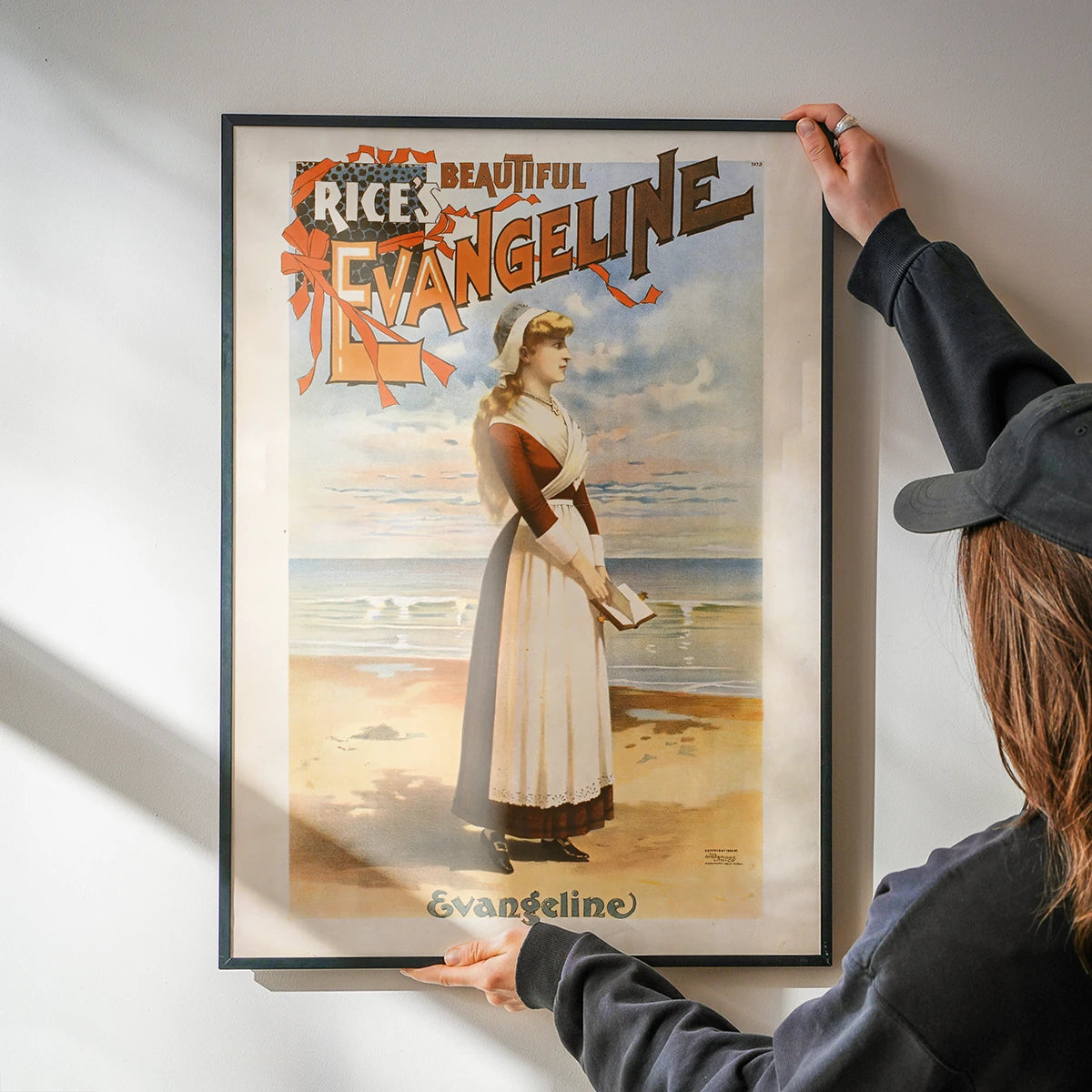 Retro seaside poster print of Evangeline on a kitchen wall