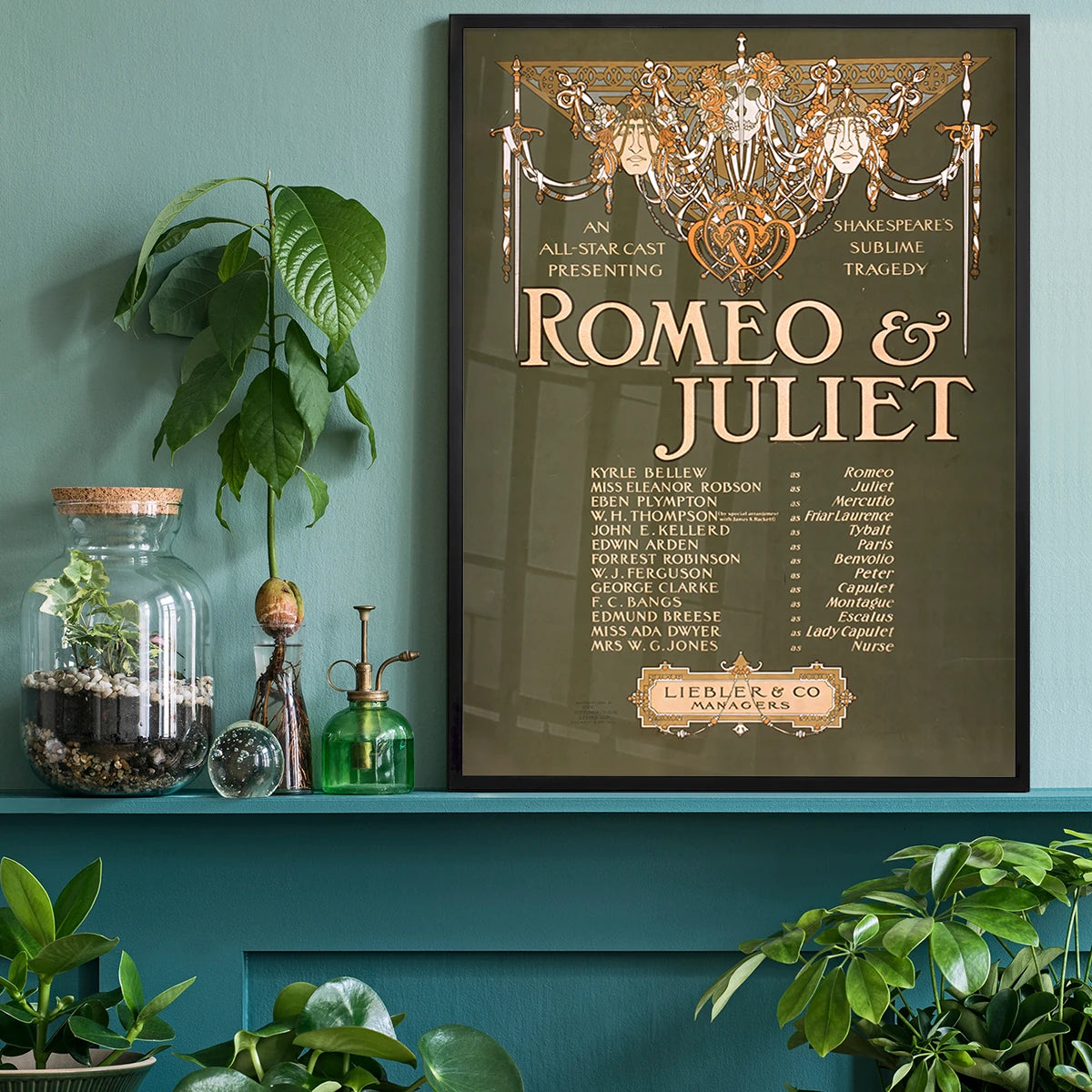 Vintage Shakespeare theatre poster as wall art in a home office