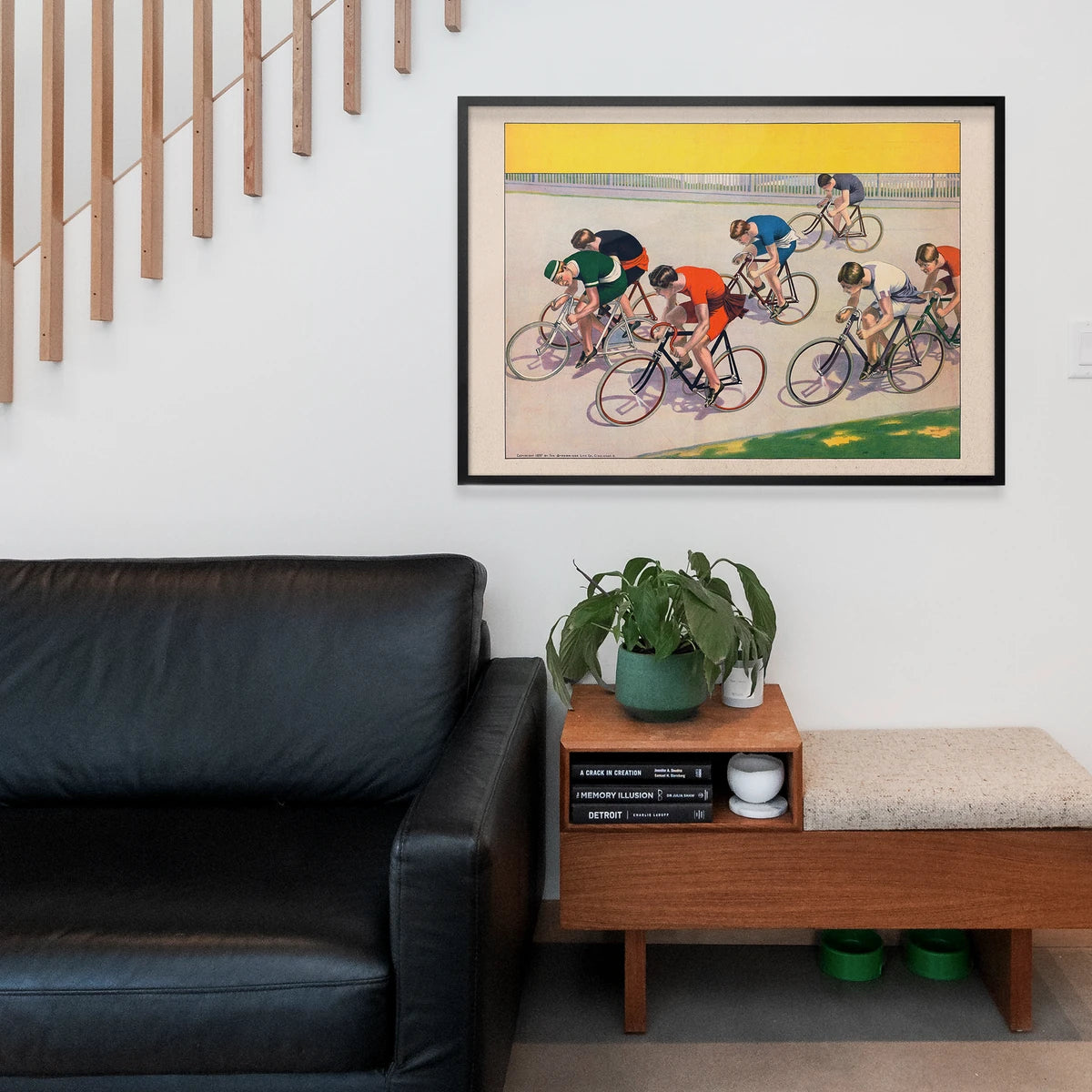 Vintage cycle racers artwork framed in a home office