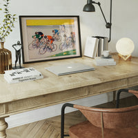 Vintage bicycle wall art hanging in a dining room
