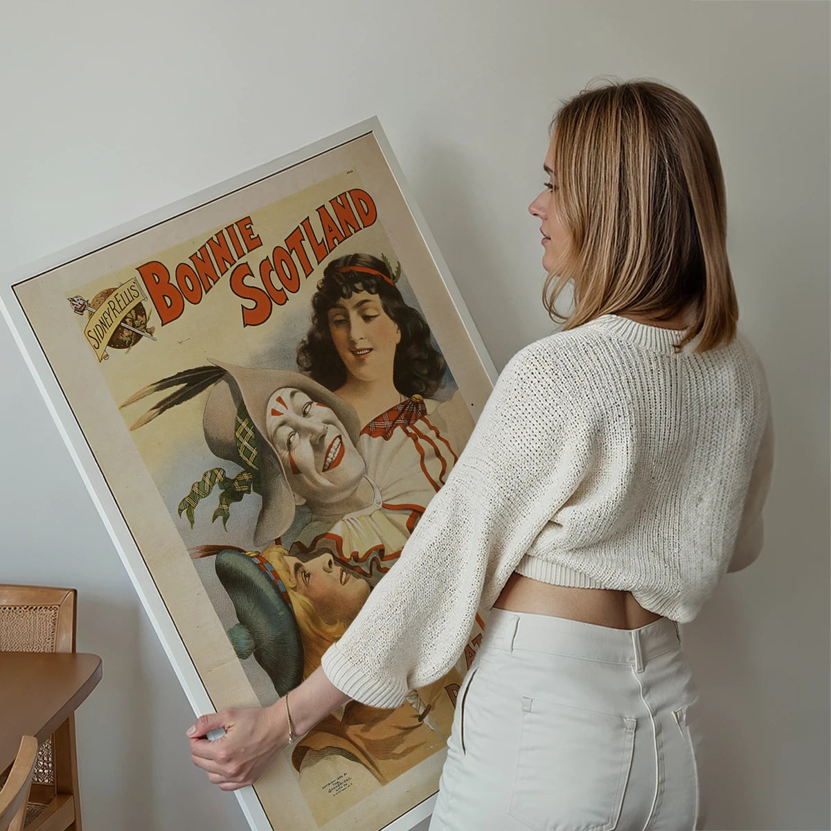 Vintage Scottish theatre poster print displayed on a living room wall