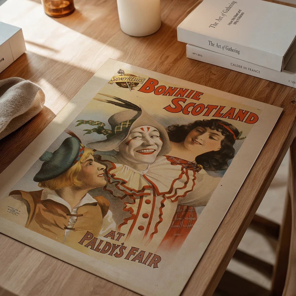 The print in a dining room, showing its warm orange and cream palette
