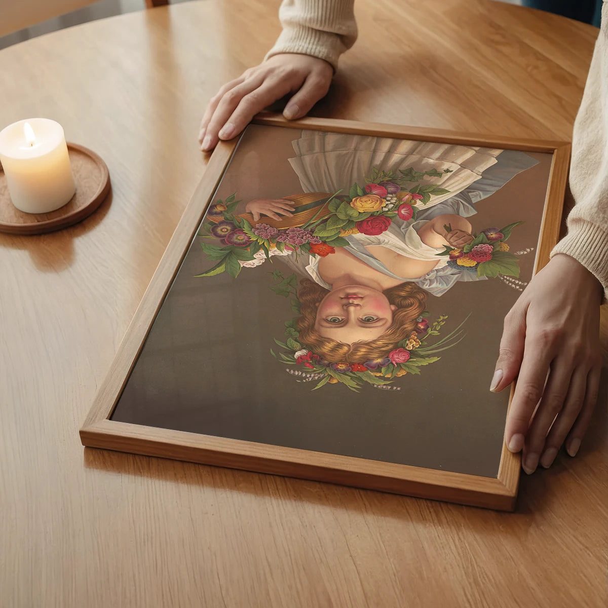 The print of a girl with a flower garland in a calm bedroom