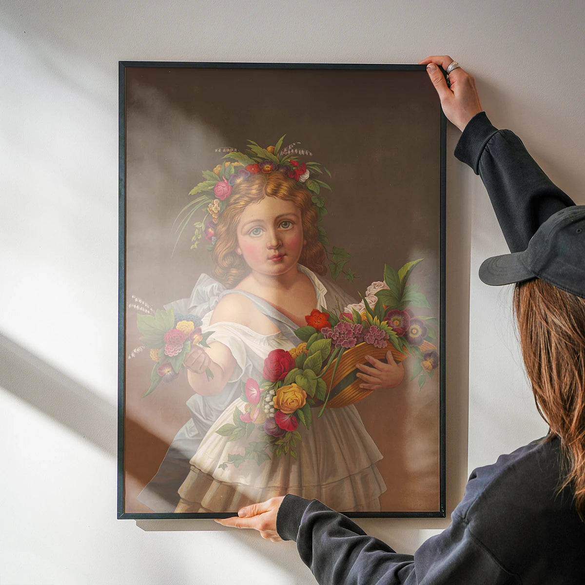 Vintage girl with flower garland artwork on a kitchen wall