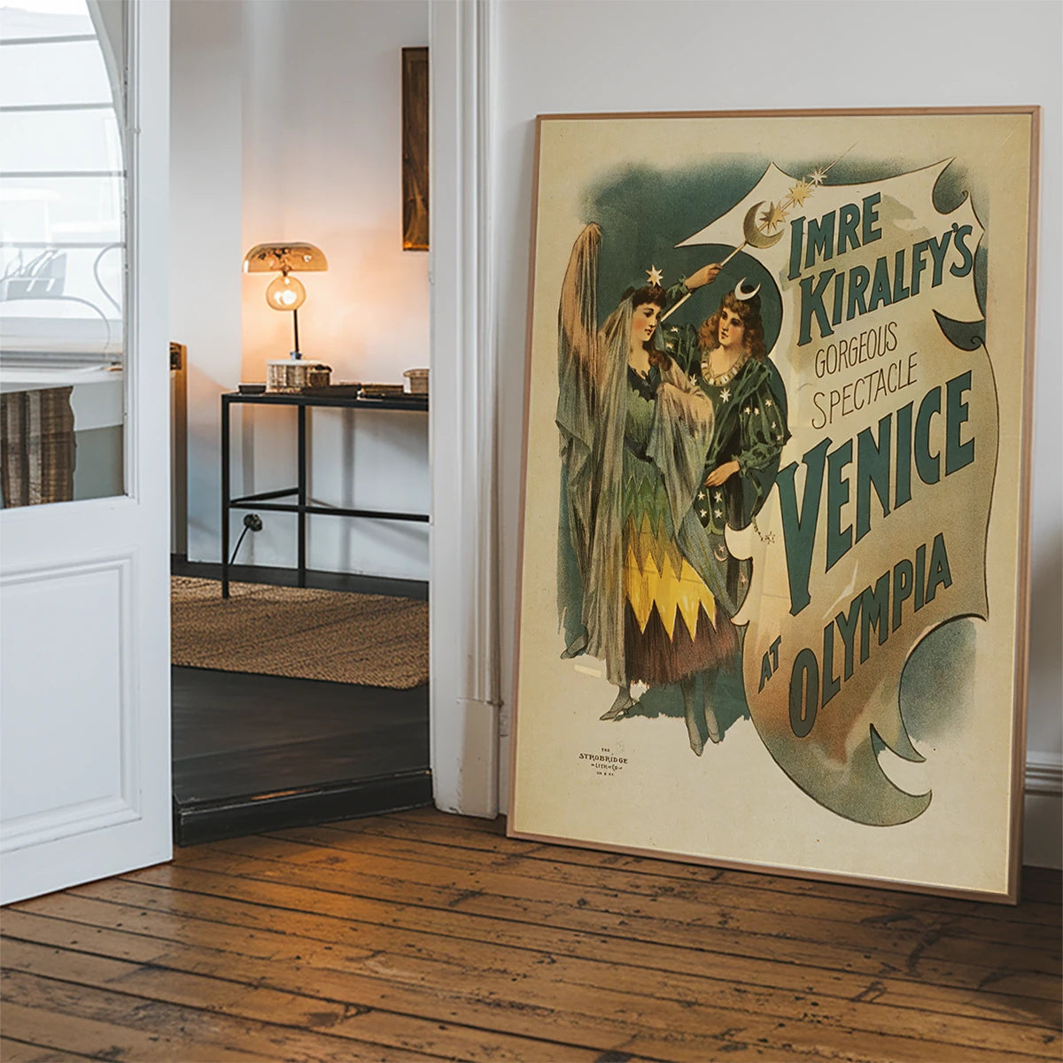 The vintage theatre poster print hanging in a hallway