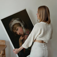 Tattoo lady portrait print displayed on a living room wall as vintage portrait wall art