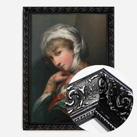 floral tattooed lady portrait print in a black ornate frame, side profile
