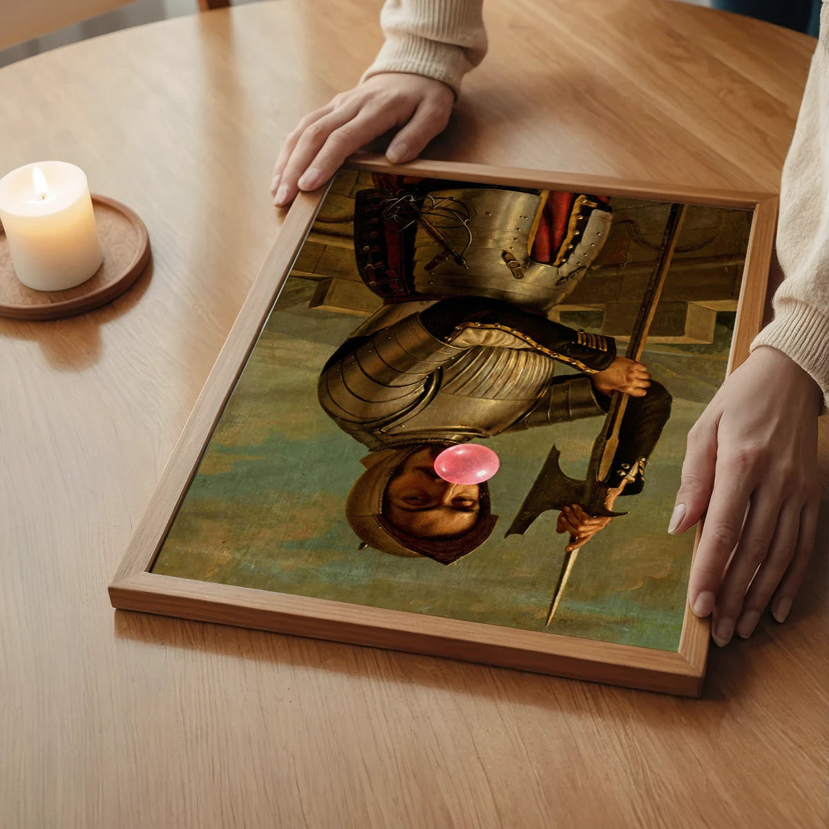 The print of a knight blowing pink bubblegum above a bedroom bed, adding a witty twist