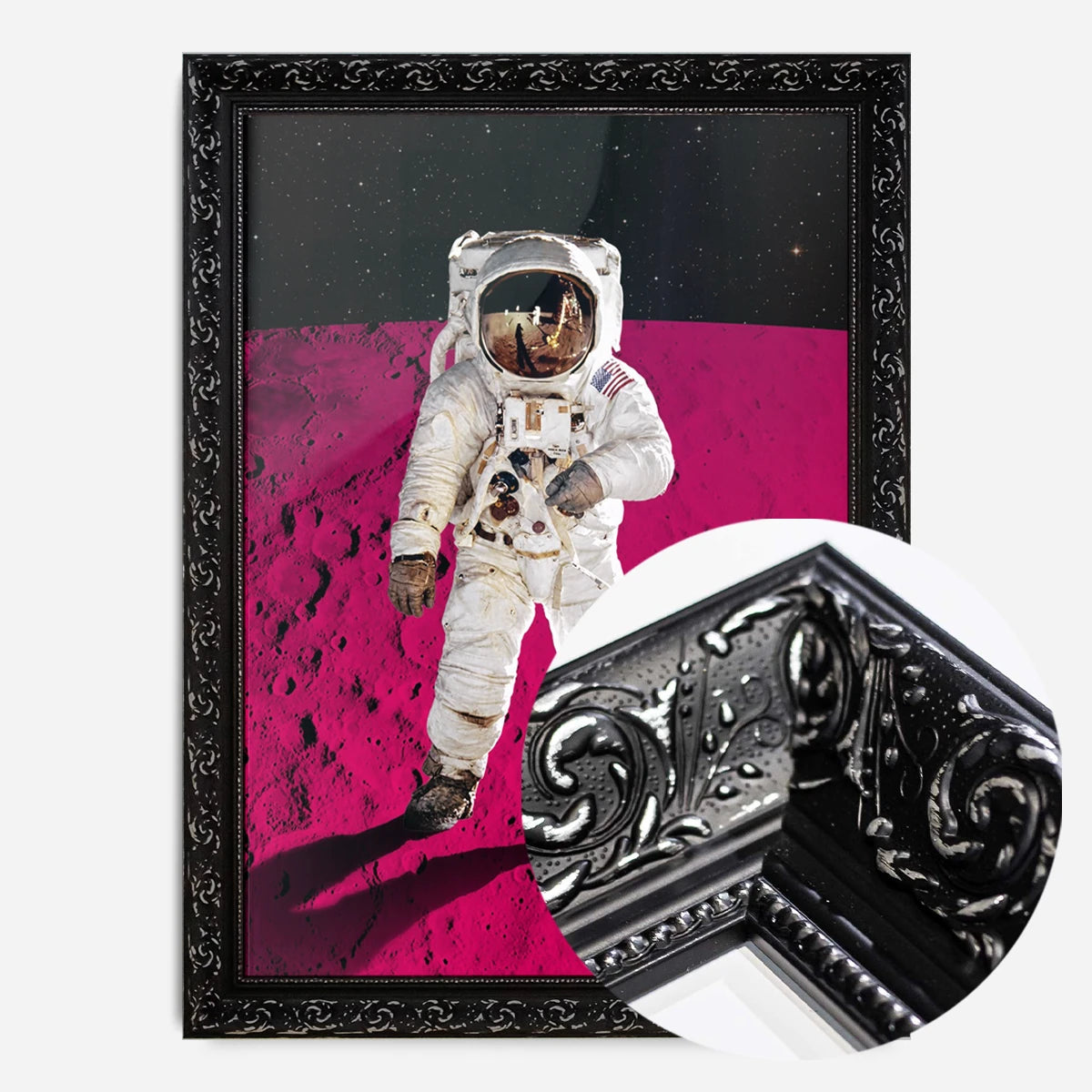 astronaut on pink moon print in a black ornate frame, side profile