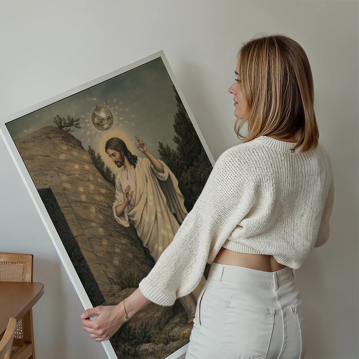 Disco Jesus print displayed on the wall of a living room