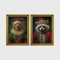 Set of 2 framed prints, animals in festive Christmas dress: a bear in a festive green and gold robe with a fur-trimmed hat; and a raccoon in a festive red robe with a crown hat — unframed