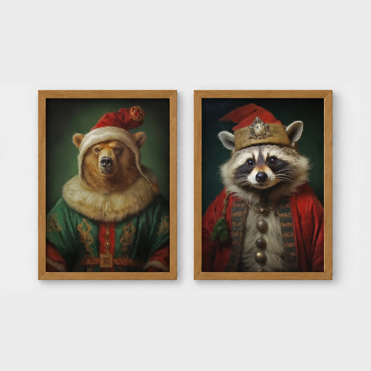Set of 2 framed prints, animals in festive Christmas dress: a bear in a festive green and gold robe with a fur-trimmed hat; and a raccoon in a festive red robe with a crown hat — unframed