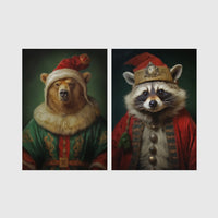 Set of 2 framed prints, animals in festive Christmas dress: a bear in a festive green and gold robe with a fur-trimmed hat; and a raccoon in a festive red robe with a crown hat — unframed