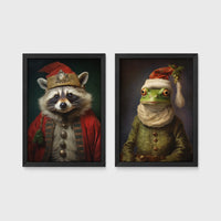 Set of 2 framed prints, animals in festive Christmas dress: a raccoon in a festive red robe and hat; and a frog in a green festive outfit with a Santa-style hat — unframed