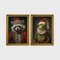 Set of 2 framed prints, animals in festive Christmas dress: a raccoon in a festive red robe and hat; and a frog in a green festive outfit with a Santa-style hat — unframed