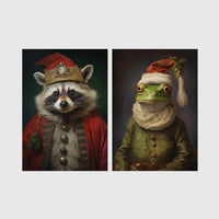 Set of 2 framed prints, animals in festive Christmas dress: a raccoon in a festive red robe and hat; and a frog in a green festive outfit with a Santa-style hat — unframed
