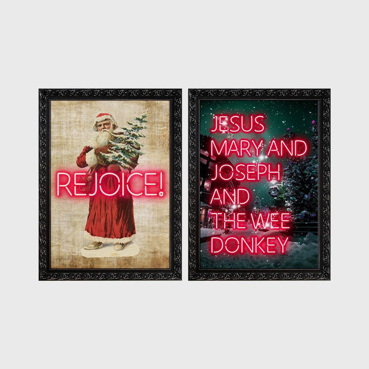 Set of 2 framed prints, festive typography and illustration: a vintage Santa illustration with neon "Rejoice!" text; and neon "Jesus, Mary and Joseph and the Wee Donkey" text over a snowy tree scene — unframed
