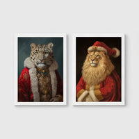 Set of 2 framed prints, animals in festive Christmas dress: a snow leopard in a festive red and gold robe; and a lion in a full Santa outfit — unframed