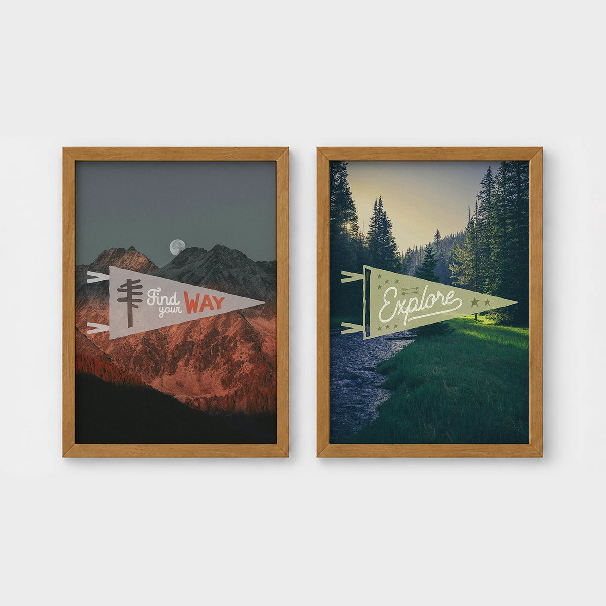 Set of 2 framed prints, adventure pennant illustrations: a "Find Your Way" pennant flag over mountains at night; and an "Explore" pennant flag over a forest stream — unframed