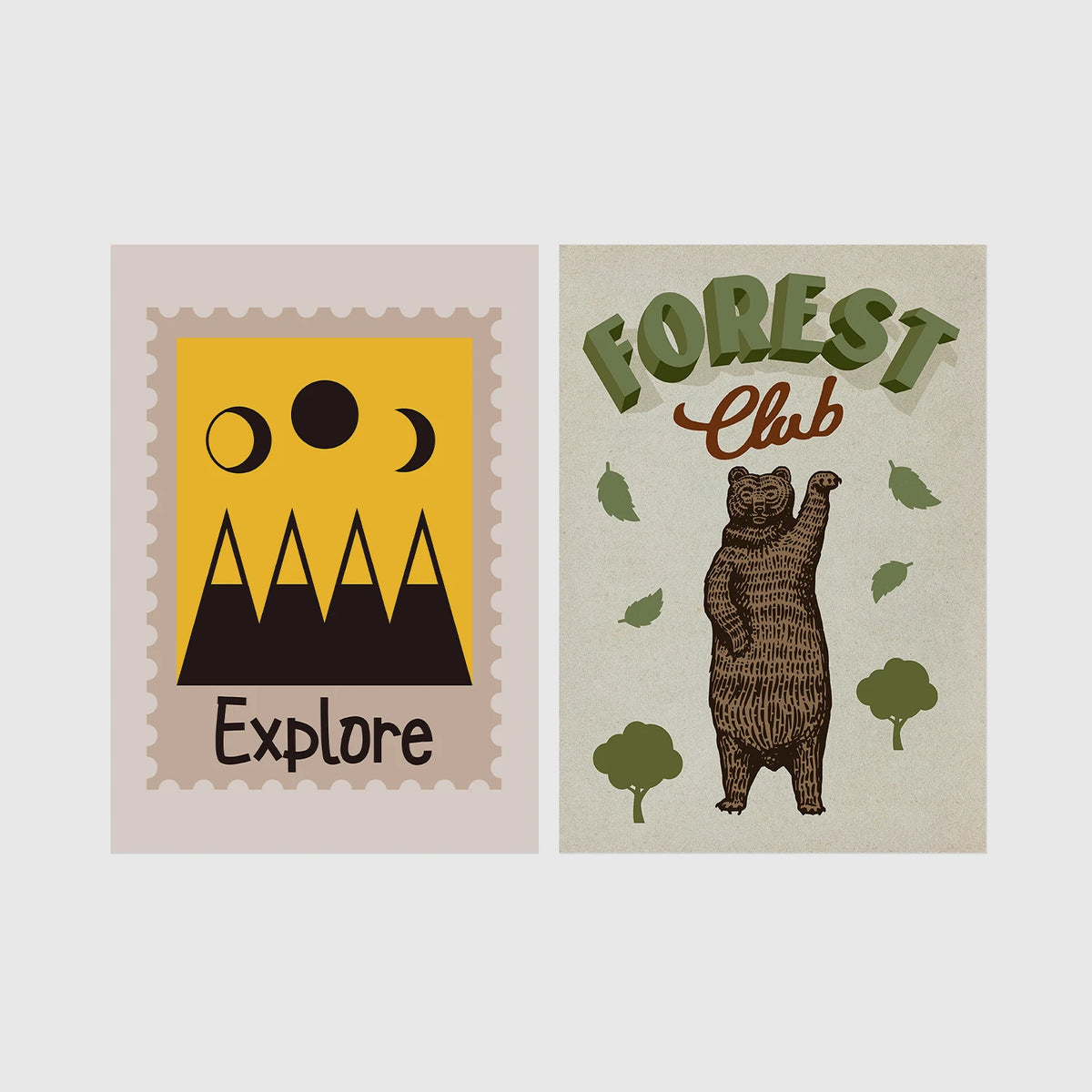 Set of 2 framed prints, stamp-style and illustrated kids prints: an "Explore" stamp-style icon illustration of mountains and moon phases; and a "Forest Club" illustration of a bear among trees — unframed