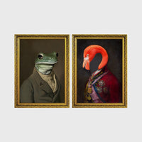 Set of 2 framed prints, animals in character/noble dress: a frog in a plain suit; and a flamingo in a royal red robe with medals — unframed