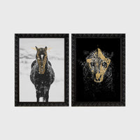 Set of 2 framed prints, animals with gold-painted highlights: a black and white horse in snow with gold-painted highlights; and a black leopard portrait with gold facial markings on black — unframed