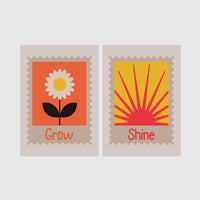 Set of 2 framed prints, stamp-style icon illustrations: a "Grow" stamp-style icon illustration of a flower; and a "Shine" stamp-style icon illustration of a sun — unframed