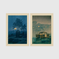 Set of 2 framed prints, Kawase Hasui Japanese woodblock prints (night scenes): a moonlit tree and stone lantern at night; and a misty rain-soaked house with lantern light at dusk — unframed