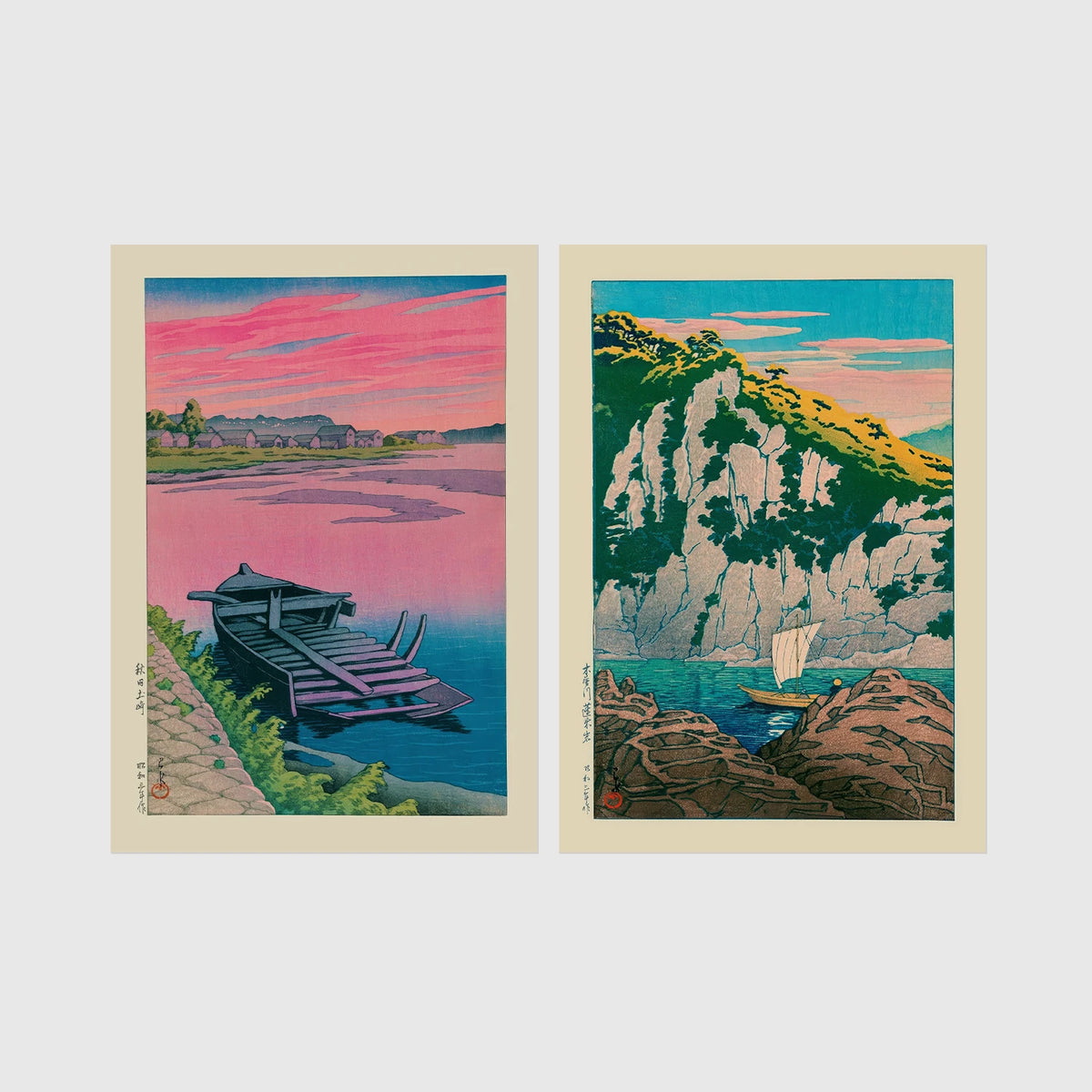 Set of 2 framed prints, Kawase Hasui Japanese woodblock prints: a pink sunset lake scene with a moored boat; and green coastal cliffs with a small sailboat — unframed
