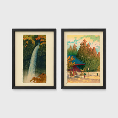 Set of 2 framed prints, Kawase Hasui Japanese woodblock prints: a waterfall cascading through autumn foliage; and a red pagoda gate in an autumn forest — unframed