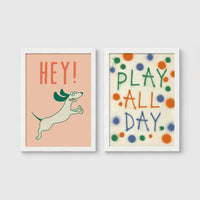 Set of 2 framed prints, playful kids' illustrations: a "Hey!" illustration of a leaping dachshund; and a "Play All Day" polka-dot typography print — unframed
