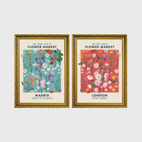 Set of 2 framed prints, flower market pattern prints: a "Madrid Flower Market" blue floral pattern; and a "The New London Flower Market" red floral pattern — unframed