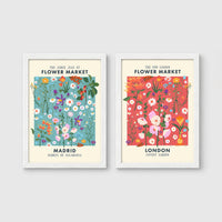 Set of 2 framed prints, flower market pattern prints: a "Madrid Flower Market" blue floral pattern; and a "The New London Flower Market" red floral pattern — unframed