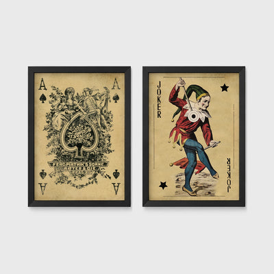 Set of 2 framed prints, vintage oversized playing cards: an ornate Ace of Spades; and a Joker — unframed