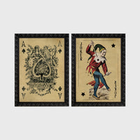 Set of 2 framed prints, vintage oversized playing cards: an ornate Ace of Spades; and a Joker — unframed