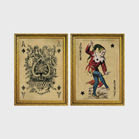 Set of 2 framed prints, vintage oversized playing cards: an ornate Ace of Spades; and a Joker — unframed