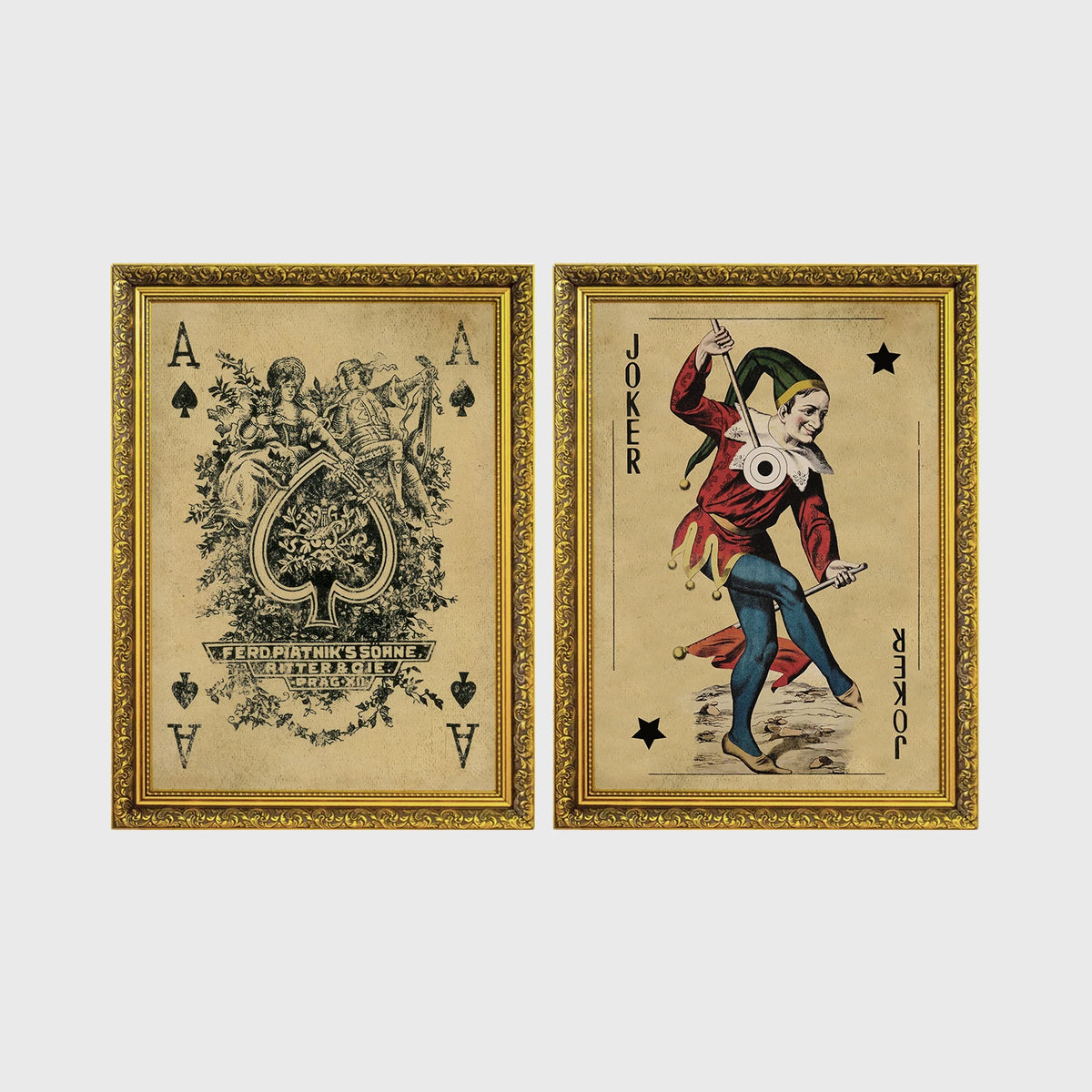 Set of 2 framed prints, vintage oversized playing cards: an ornate Ace of Spades; and a Joker — unframed