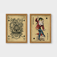 Set of 2 framed prints, vintage oversized playing cards: an ornate Ace of Spades; and a Joker — unframed