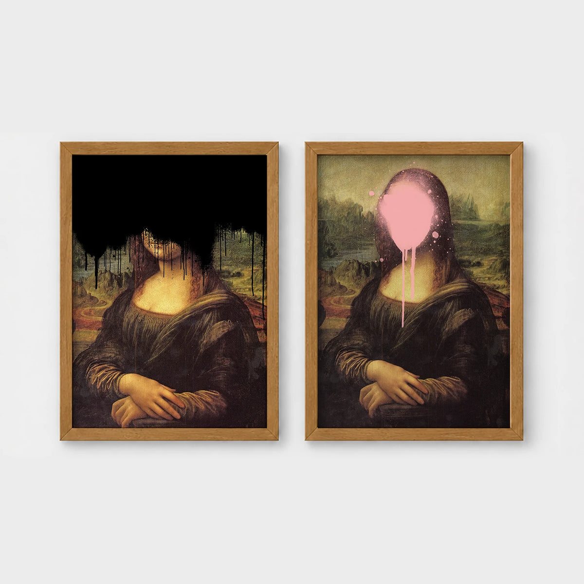 Set of 2 framed prints, classical art with pop-culture twists: the Mona Lisa with black dripping paint over the face; and the Mona Lisa with a pink paint splat over the face — unframed