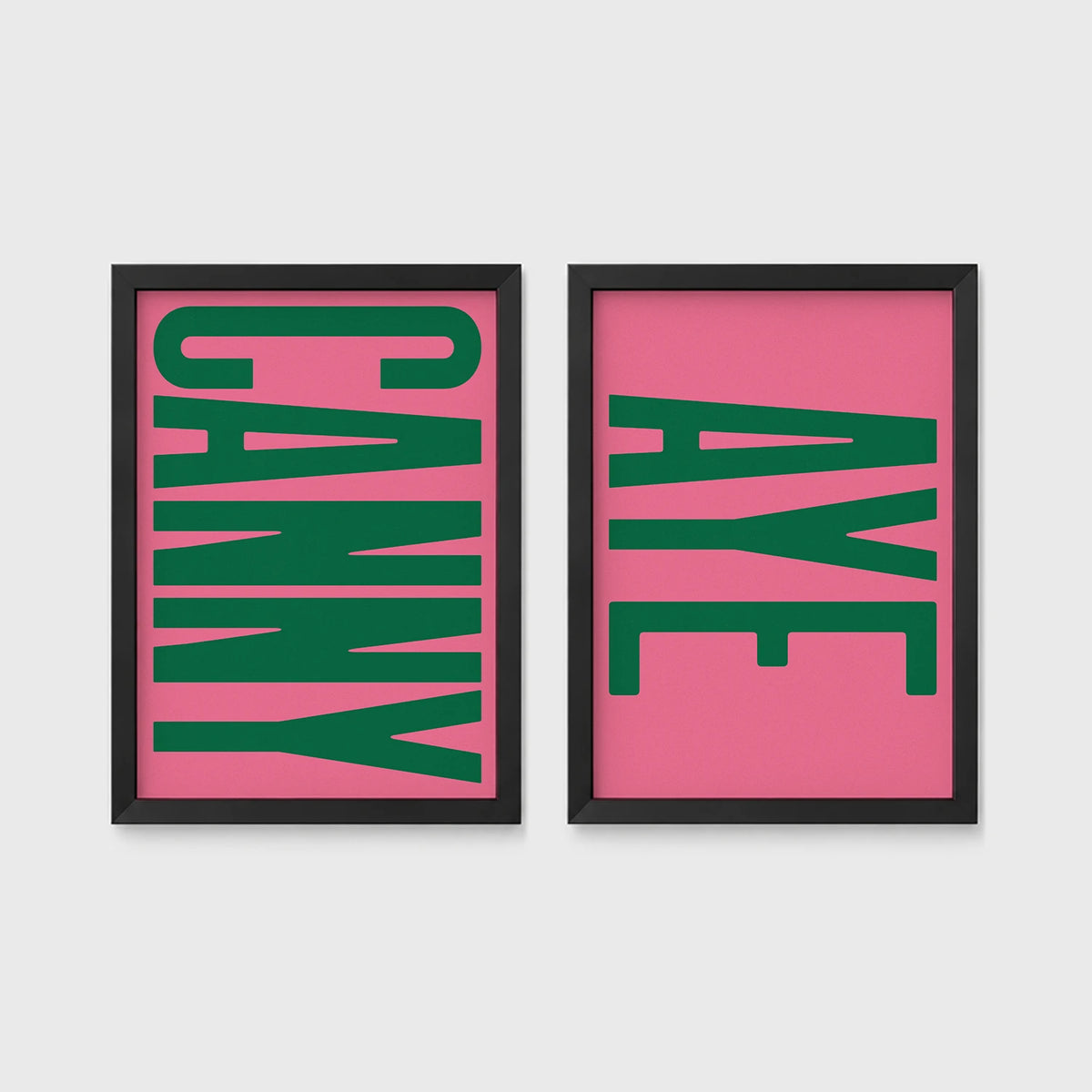 Set of 2 framed prints, Newcastle & Geordie dialect prints: the word "Canny" in bold green retro type on pink; and the word "Aye" in bold green retro type on pink — unframed